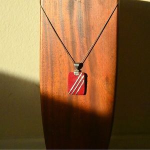 Red amber and sterling silver pendant